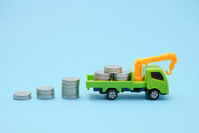 High angle view of toys against blue background