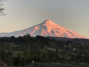 Scenic view of snowcapped mountain against sky
