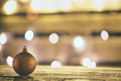 Close-up of christmas lights on table