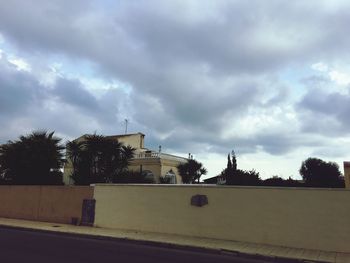 View of road against cloudy sky