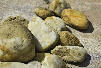 High angle view of stones on rocks