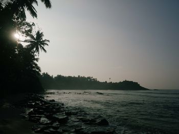 Scenic view of sea against sky at sunset