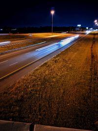 Light trails on road at night