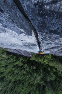 Scenic view of sea by mountain