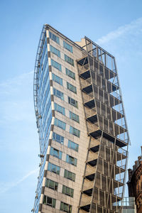 Low angle view of modern building against sky