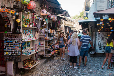 People at street market in city