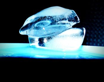 Close-up of bubbles over black background