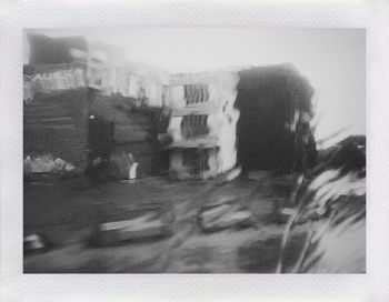 Close-up of man against window