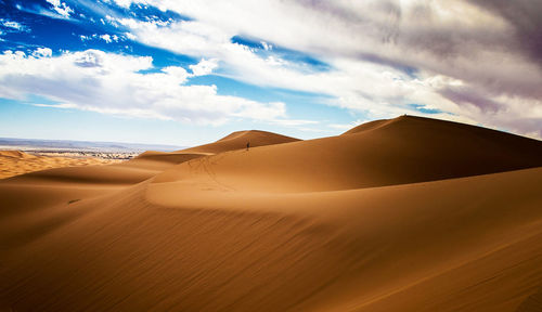 Scenic view of desert against sky