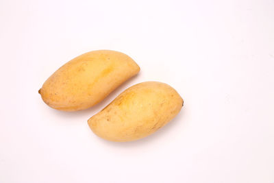 Close-up of cookies against white background