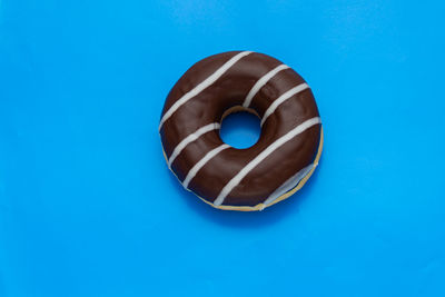 High angle view of ice cream against blue background