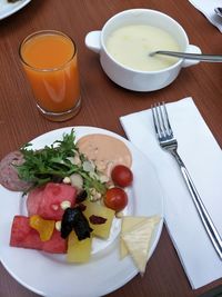 High angle view of breakfast served on table