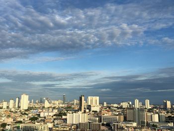 Cityscape against sky during sunset