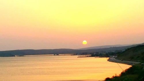 Scenic view of landscape at sunset