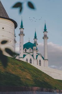 View of cathedral and buildings against sky