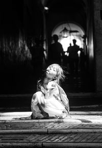 Full length of girl looking at camera