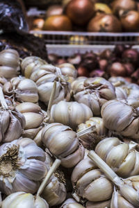 Close-up of onions for sale at market stall
