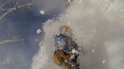 High angle view of person snowboarding
