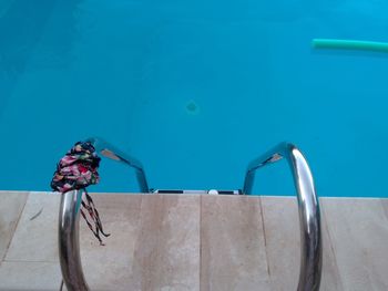 Man swimming in pool