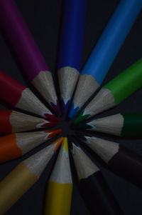 Directly above shot of multi colored pencils on table