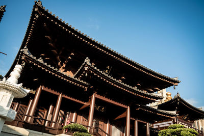 Low angle view of pagoda against sky