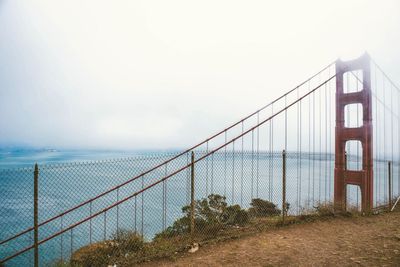 View of suspension bridge at beach