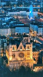 High angle view of buildings at night