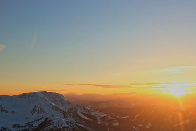 Scenic view of mountains against sky during sunset