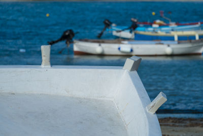 Fishing boats moored at beach