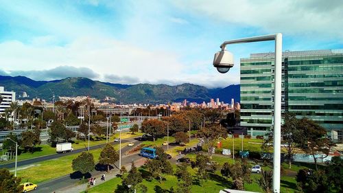 View of city against cloudy sky