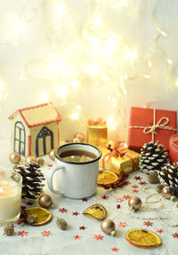 High angle view of food and drink with christmas decorations on table