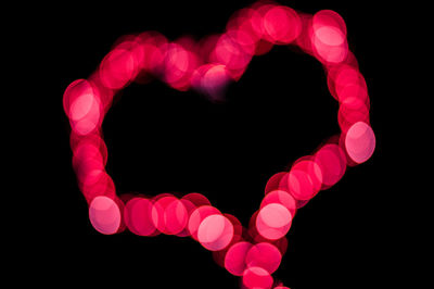 Close-up of heart shape against black background