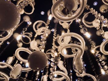 Low angle view of illuminated chandelier