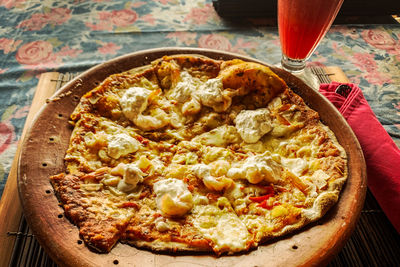 High angle view of pizza on table