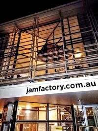 Low angle view of text on building at night