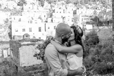 Couple standing outdoors