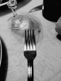 Close-up of wineglass on table