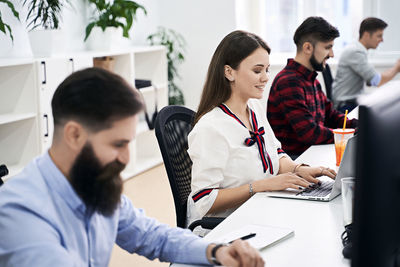 Business colleagues working at office