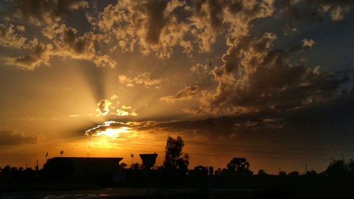 Scenic view of silhouette landscape against sky during sunset