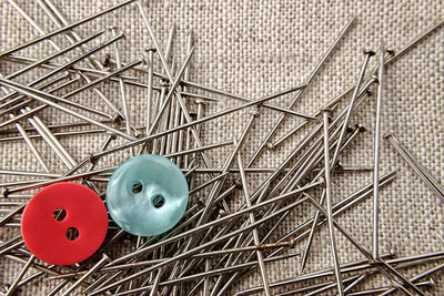 High angle view of stuffed toy on metal grate