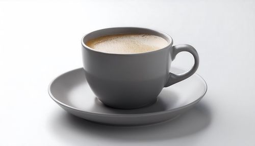 Close-up of coffee on white background