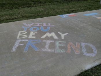 High angle view of text written on road