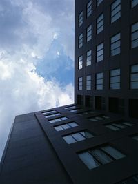 Low angle view of modern building against sky