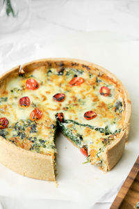 High angle view of pizza in plate on table