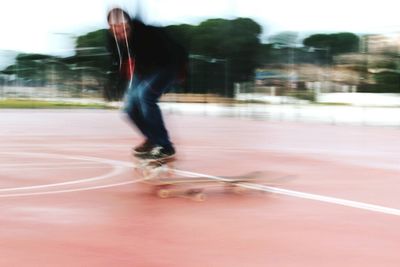 Blurred motion of man running