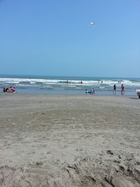 Scenic view of beach against clear sky