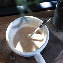 Close-up of coffee cup on table