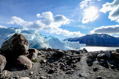 Panoramic view of landscape and glacier against sky