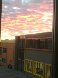 Built structure against sky during sunset