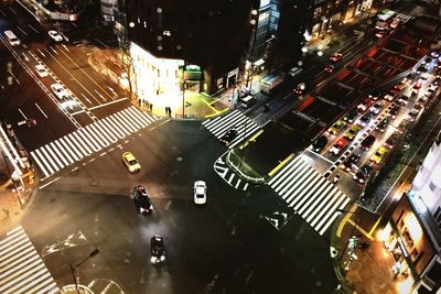 High angle view of crowd on city street at night